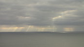 SX00545 Sunrays through clouds on sea.jpg